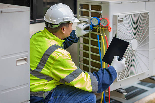 Professional Hvac technician working in Wellsville, UT